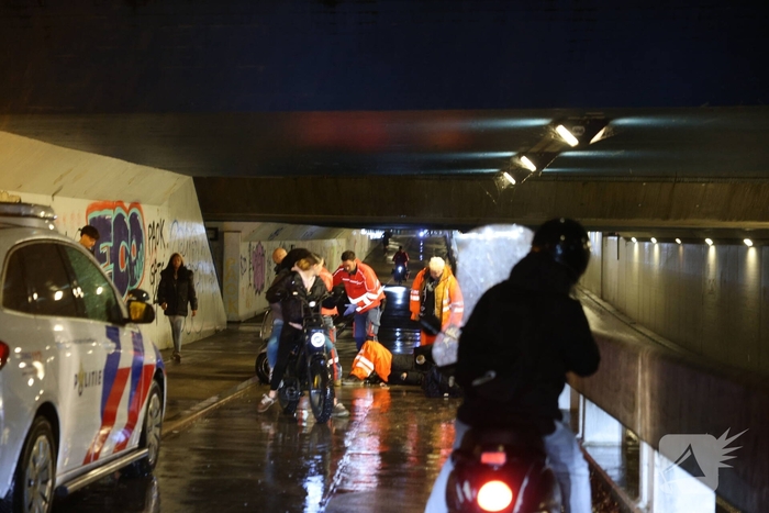 Scooter en scootmobiel botsen op fietspad