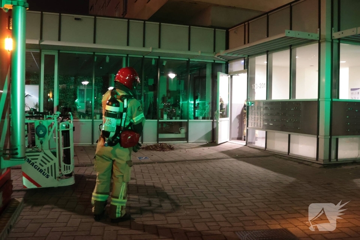 Brand in flatwoning leidt tot evacuaties