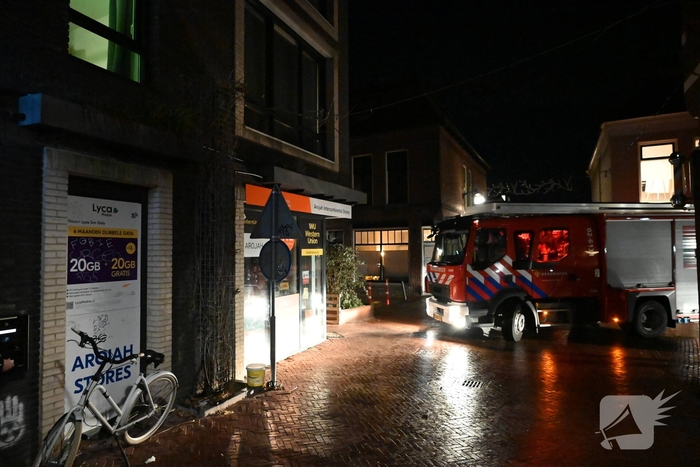 Klimop geblust met emmer water