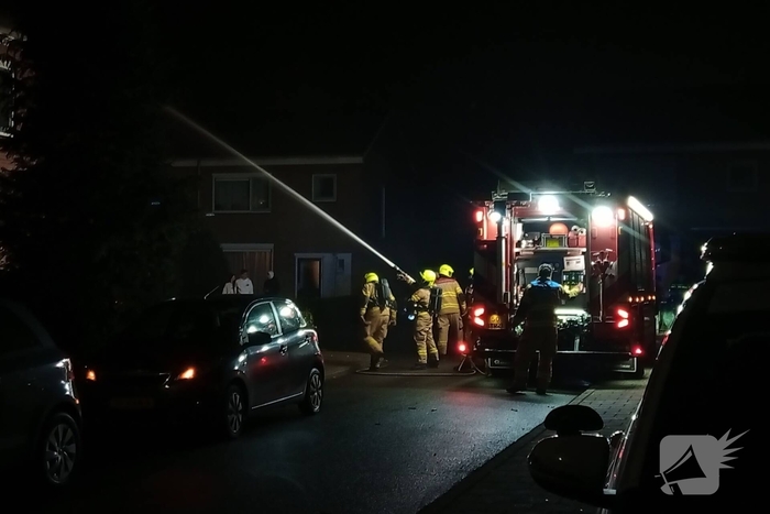 Brand in dakgoot van woning
