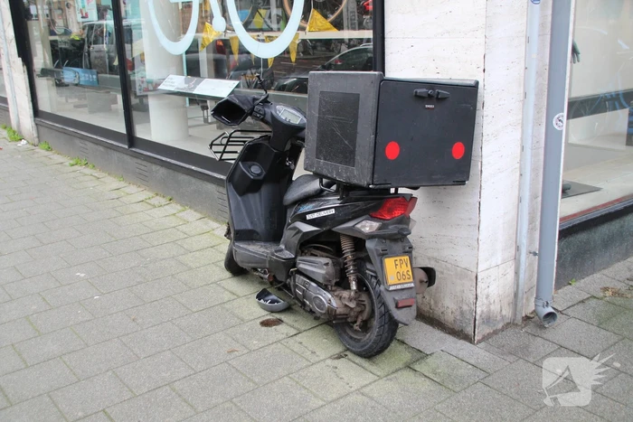 Ongeval tussen scooter en auto