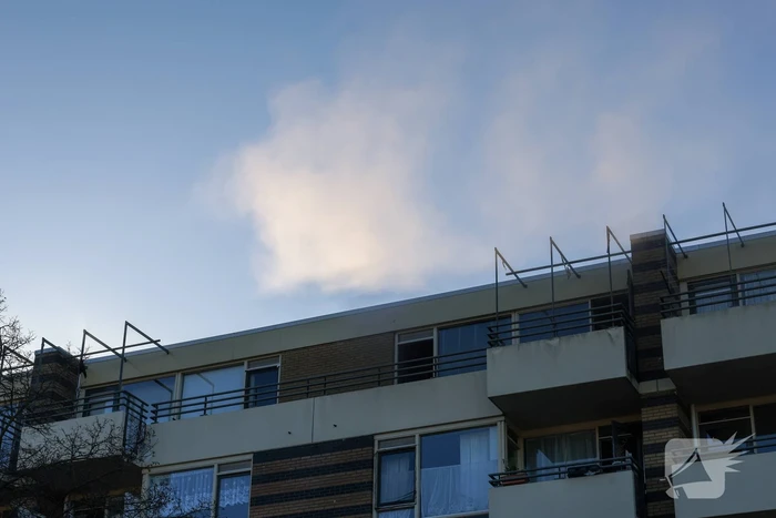 Politie pakt bewoner na woningbrand