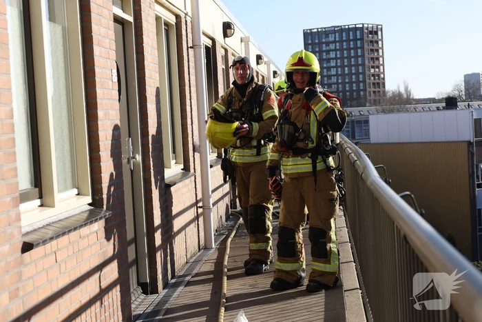 Politie pakt bewoner na woningbrand