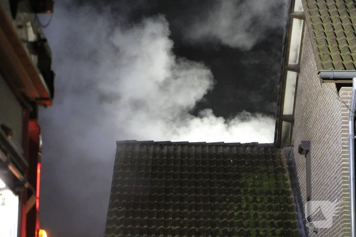 Buitenbrand verwoest garagezolder