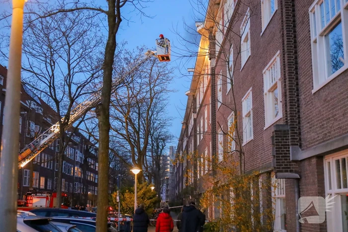 Brand in portiekwoning geblust