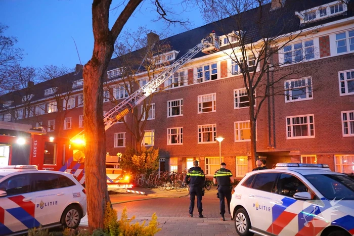 Brand in portiekwoning geblust