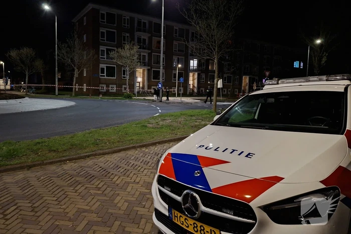 Kogelgaten in ramen van woning