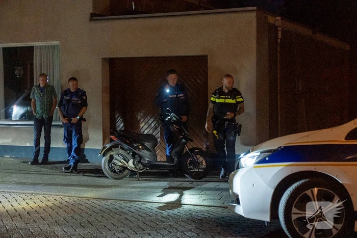 Scooter en fiets botsen met aanhouding van scooterrijder