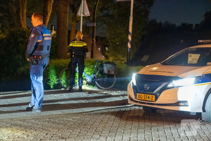 Scooter en fiets botsen met aanhouding van scooterrijder