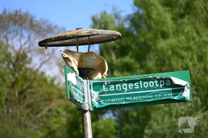 Houten brug verwoest door brand