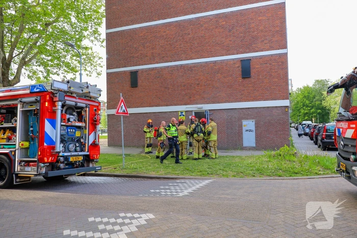 Brand in flatwoning onder controle