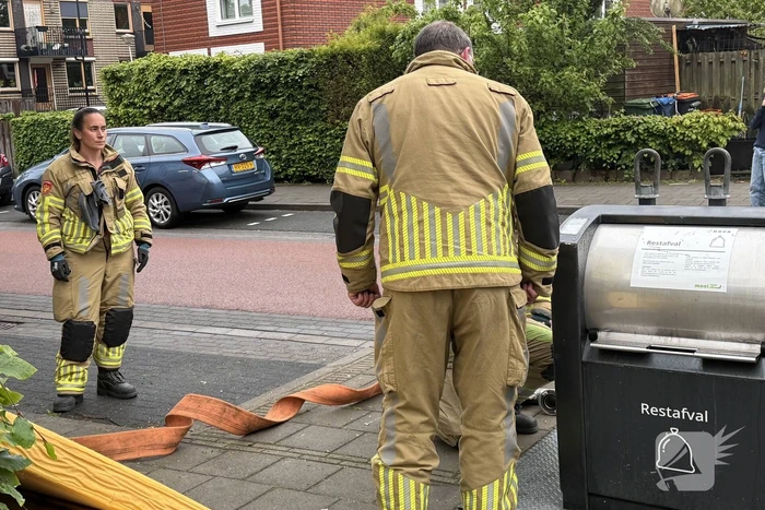 Ondergrondse container in brand