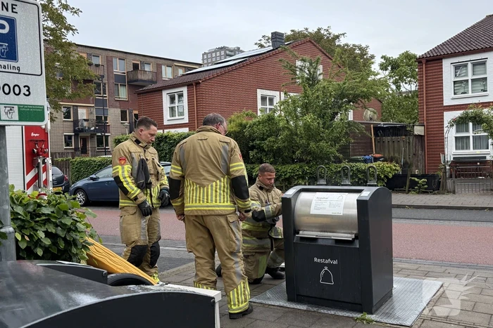 Ondergrondse container in brand