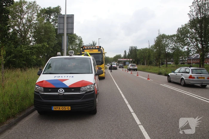 Voertuig te water na botsing
