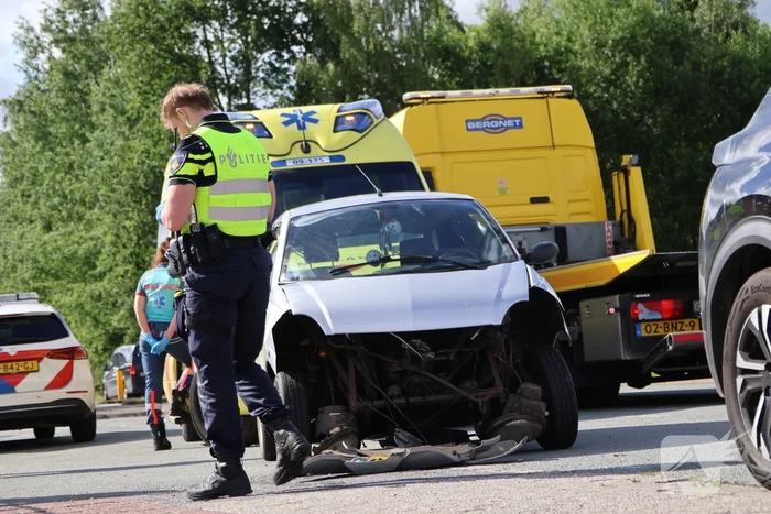 Botsing tussen auto en brommobiel
