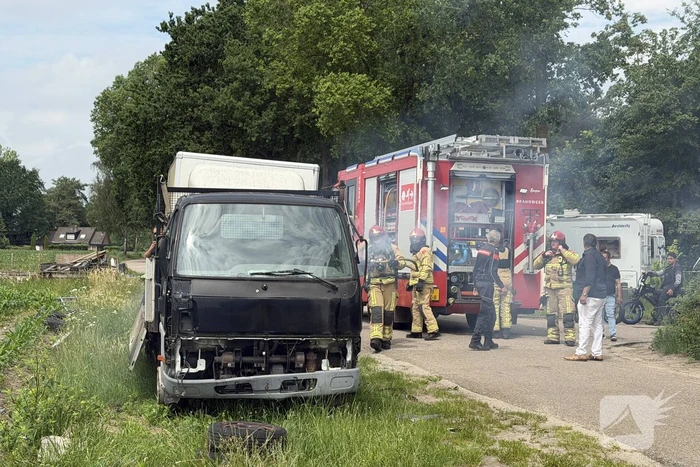 Afval in brand op vrachtwagen