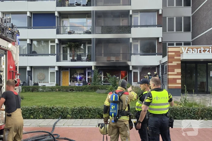 Brandweer in actie bij woningbrand