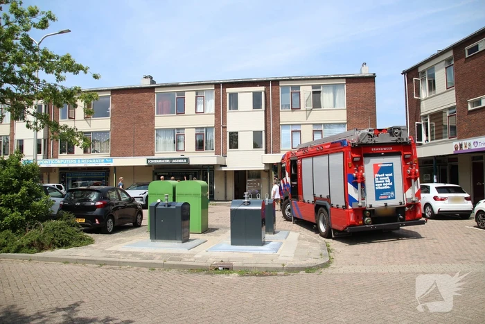 Bewoner opgesloten door vallende spiegel