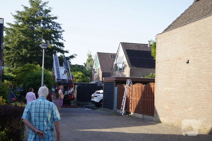 Sloopwerkzaamheden na brand in bijgebouw