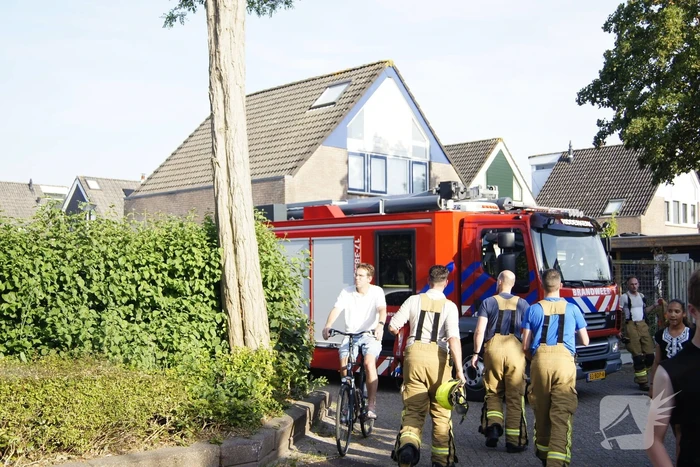 Sloopwerkzaamheden na brand in bijgebouw