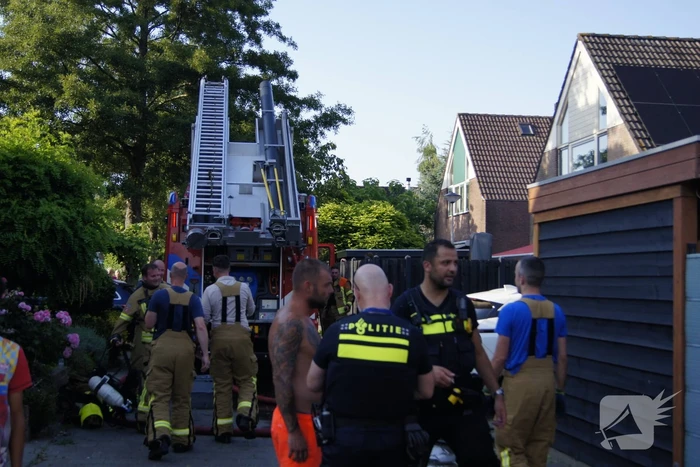 Sloopwerkzaamheden na brand in bijgebouw