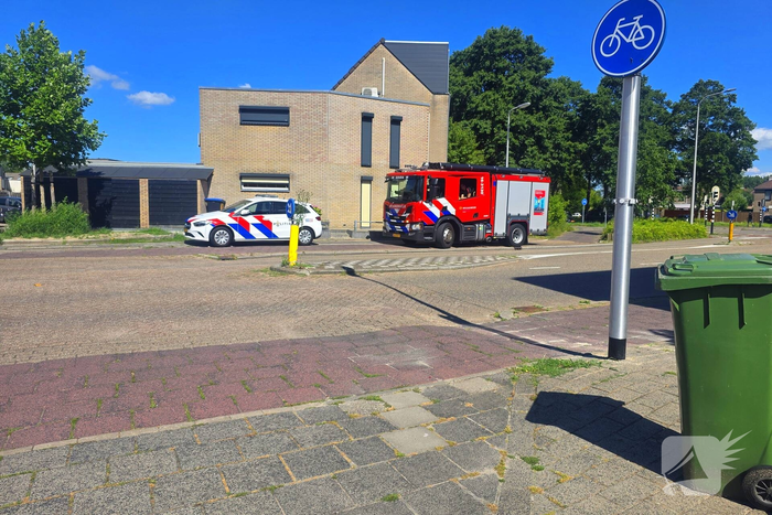 Brandweer blust wasmachinebrand
