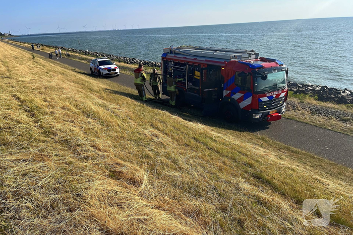 Gemaaid gras en pannetje op het vuur gedoofd