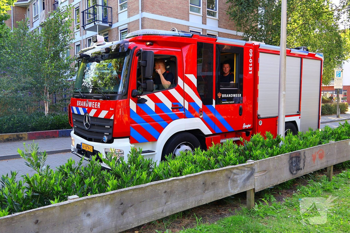 Afvalprullenbak in brand geblust door buurtbewoner