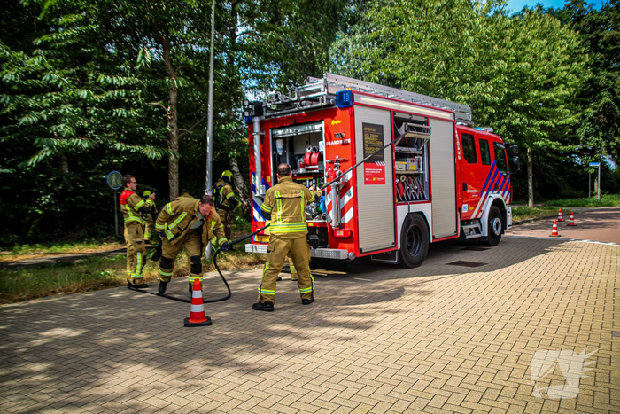 Buitenbrand in bosjes geblust