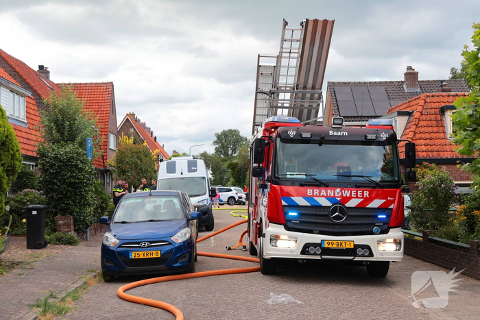 Tuinhuisje in vlammen op gegaan