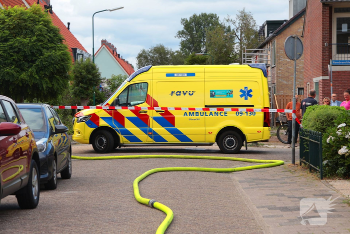 Tuinhuisje in vlammen op gegaan