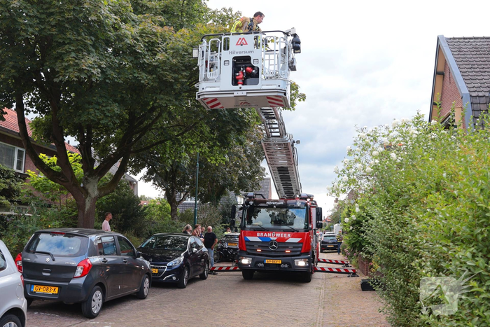 Tuinhuisje in vlammen op gegaan