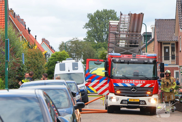 Tuinhuisje in vlammen op gegaan