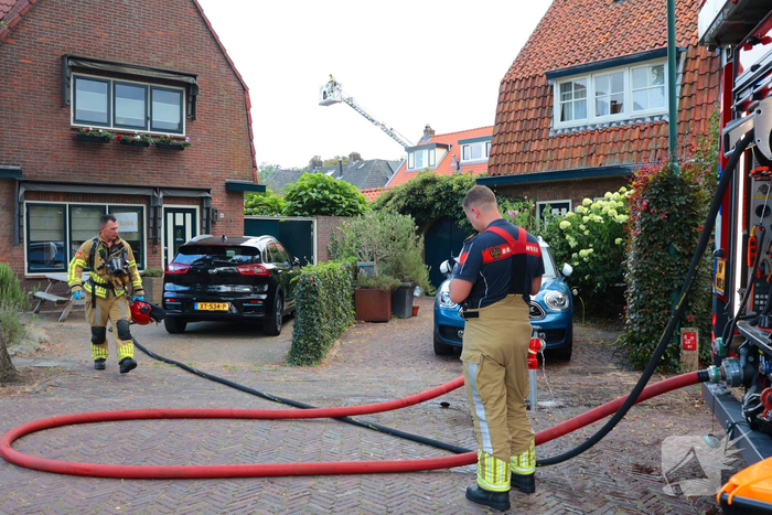 Tuinhuisje in vlammen op gegaan