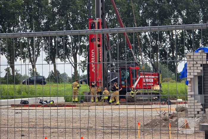 Brandweer koelt heimachine na brandmelding