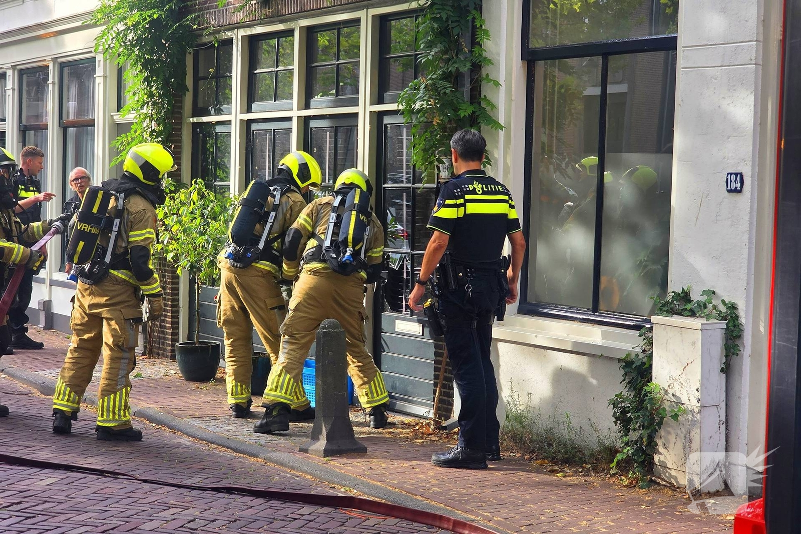 Deur geforceerd om brand in vaatwasser te bereiken