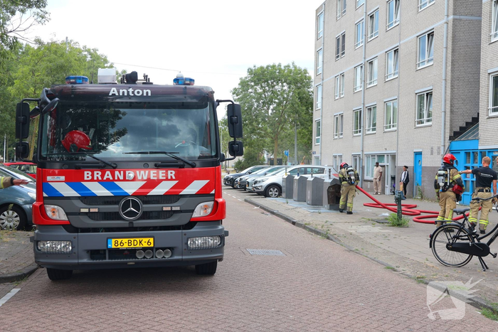 Brand in ondergrondse afvalcontainer geblust