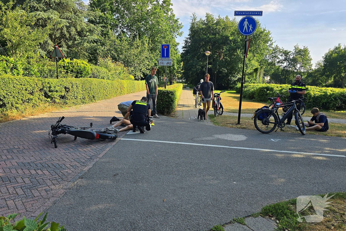 Aanrijding tussen fatbike en bezorgscooter