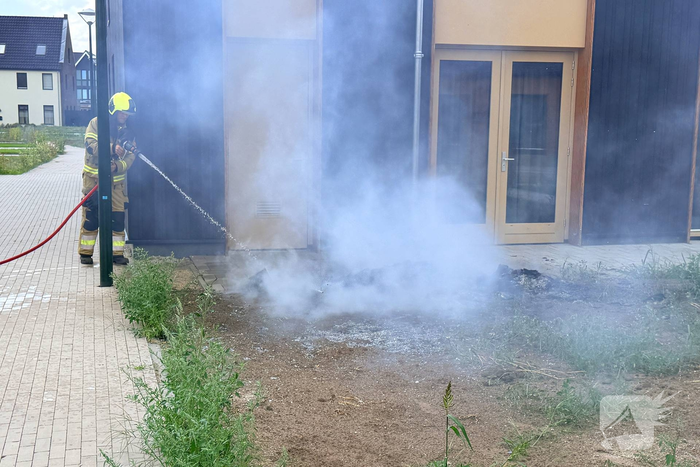 Brand in afval snel onder controle