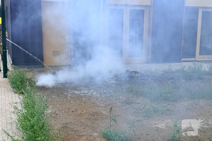 Brand in afval snel onder controle