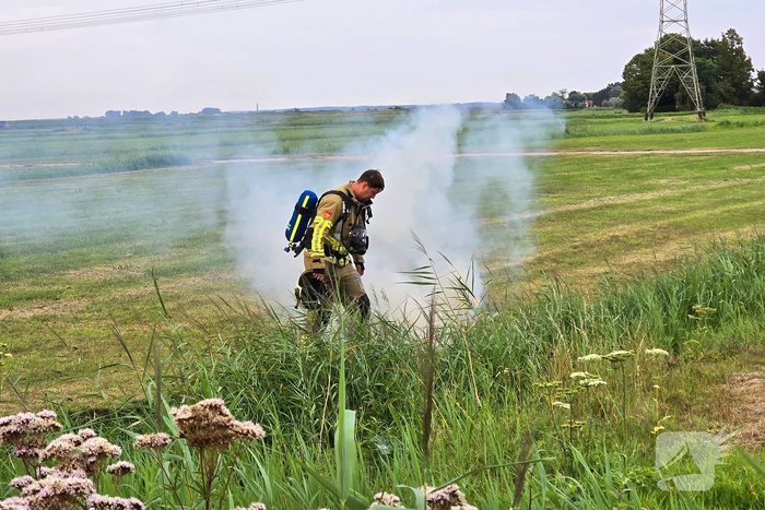 Brandweer dooft vlammen in bermen