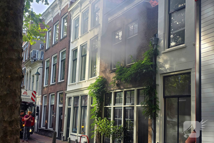 Deur geforceerd om brand in vaatwasser te bereiken