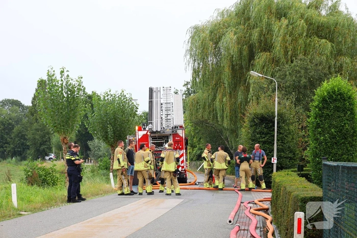 Brand in loods snel onder controle