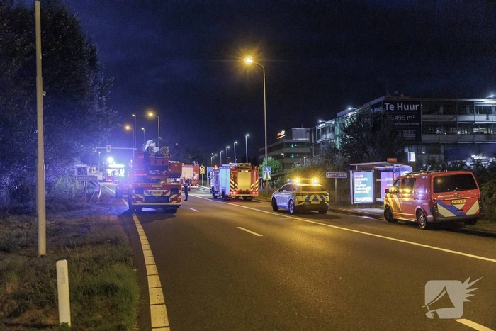 Brand aan geluidswal door daklozenkampje