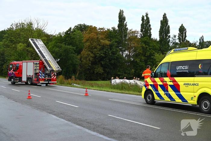 Persoon te water in Marsum