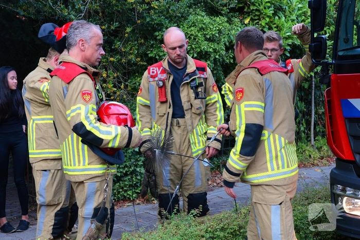 Brand in schoorsteen van woning