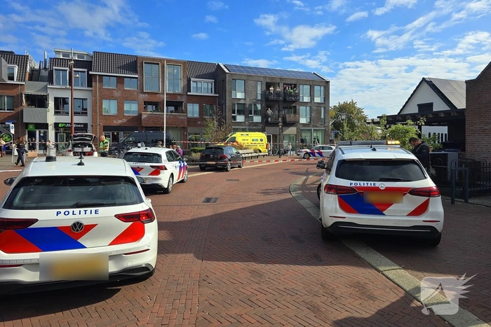 Agenten met kogelwerende vesten ter plaatse