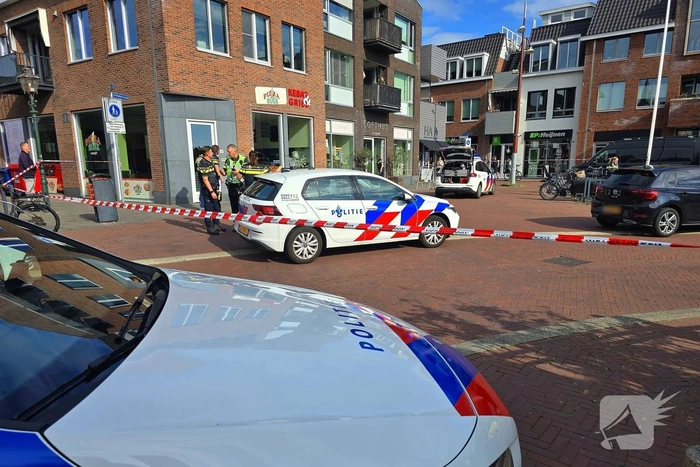 Agenten met kogelwerende vesten ter plaatse