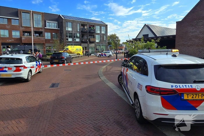 Agenten met kogelwerende vesten ter plaatse