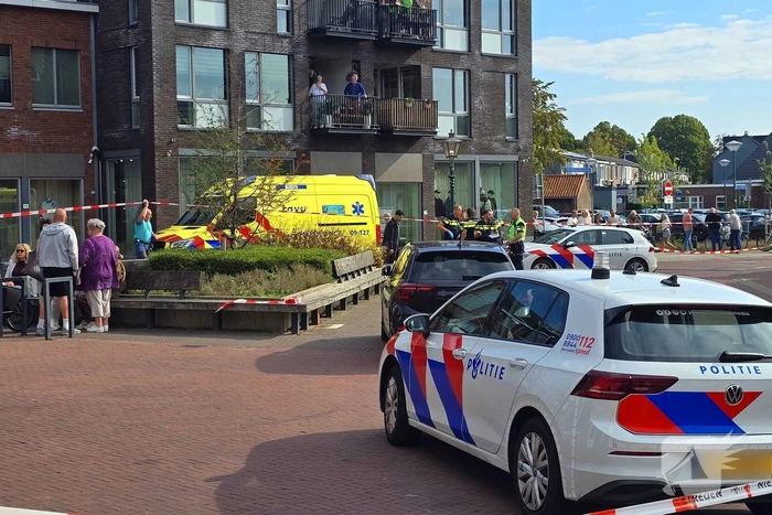 Agenten met kogelwerende vesten ter plaatse